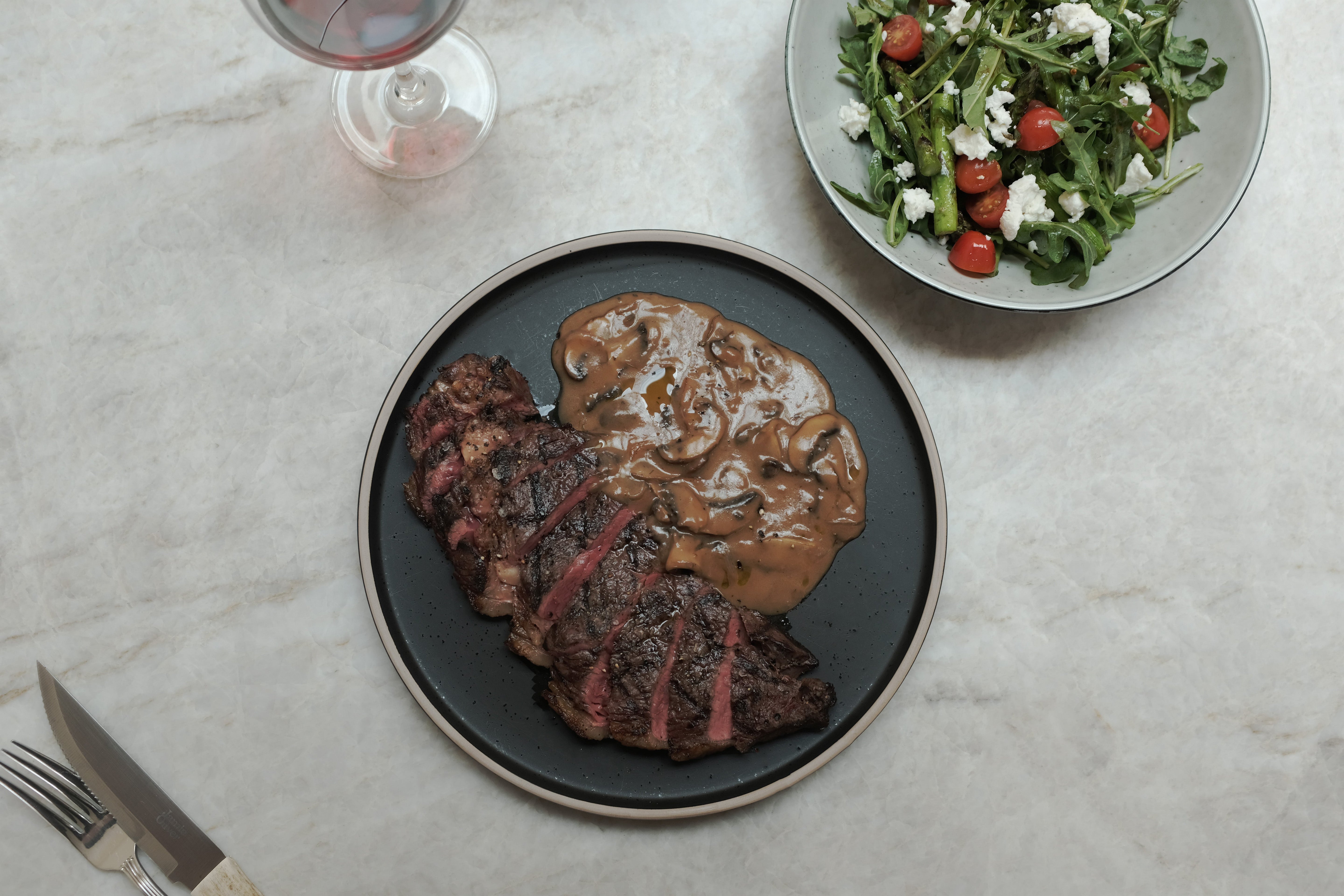 Barbecued Rump Steak with Roasted Mushroom Sauce and Asparagus Salad